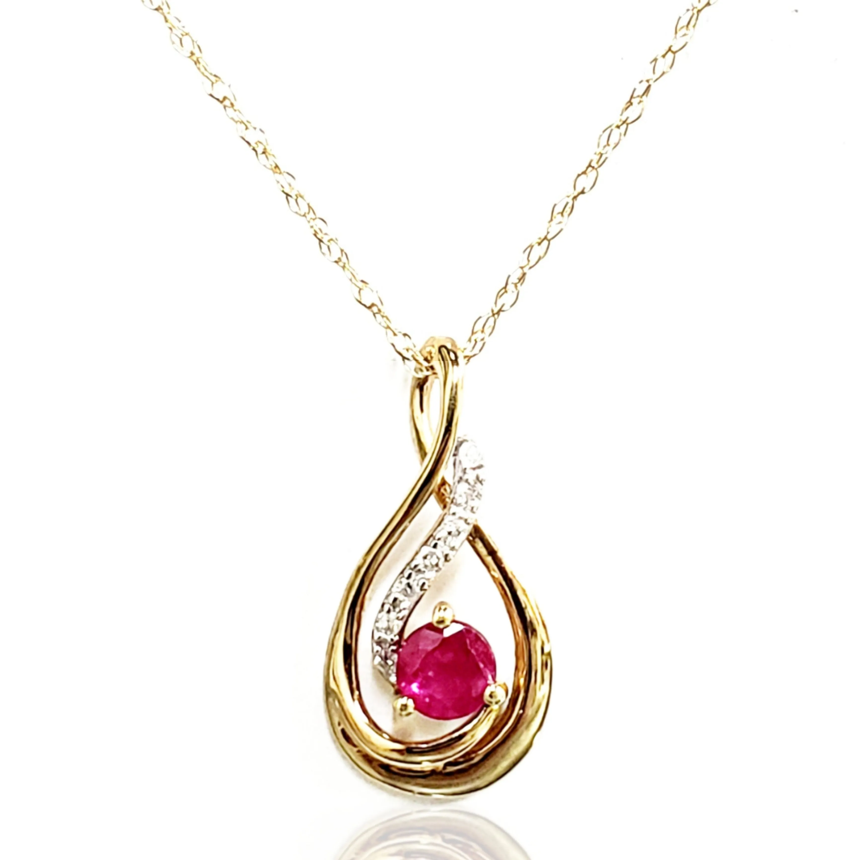 10k Gold, Diamond, And Ruby Pendant Necklace