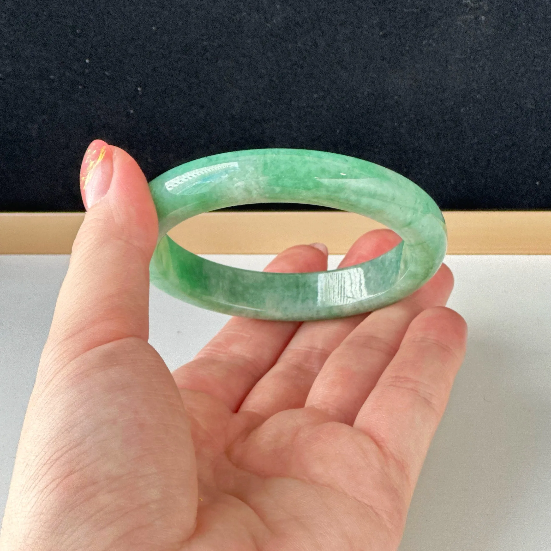 122858 57.7mm Full Apple Green Jadeite Bangle